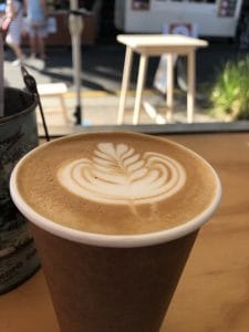 Latte art at Eumundi Coffee Cafe. Take away coffee.