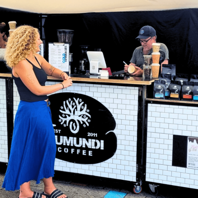 Serving Coffee at Eumundi Coffee Cafe Customer ordering at Eumundi Coffee Market cafe